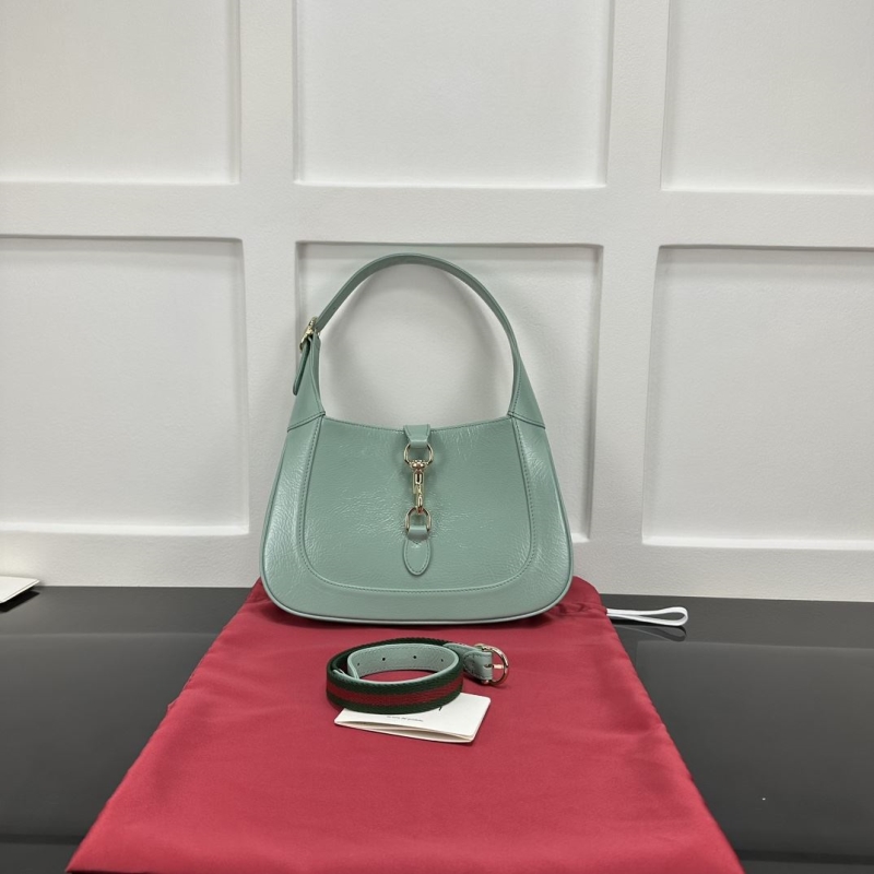 G*u*i top handle bags